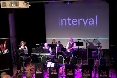 The rhythm section leads us into the interval